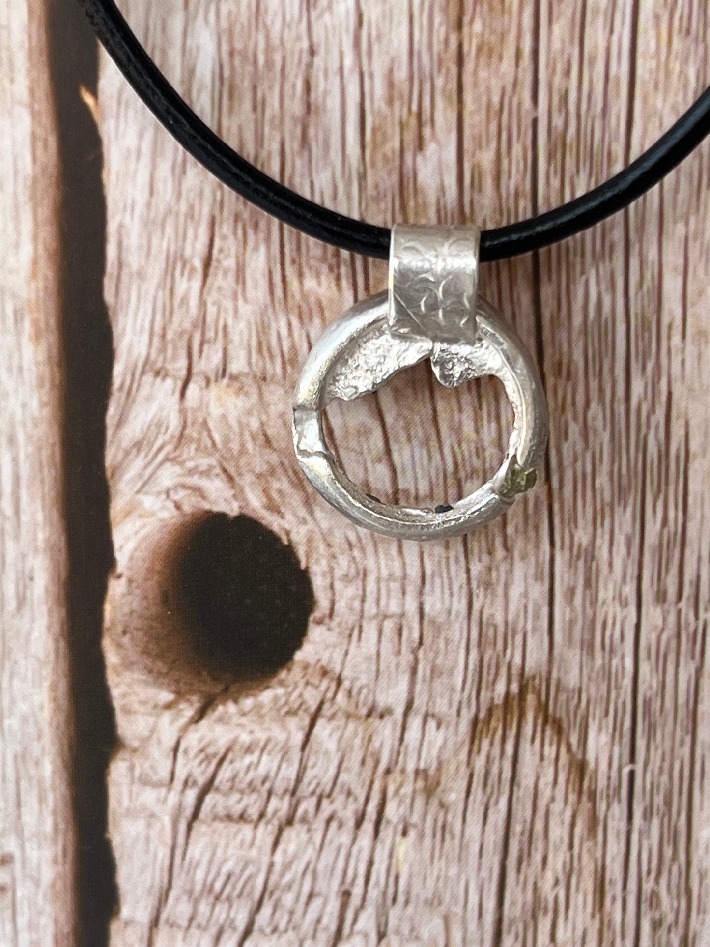 “Winton” Sterling Silver Pendant with pale green rough Queensland sapphires.